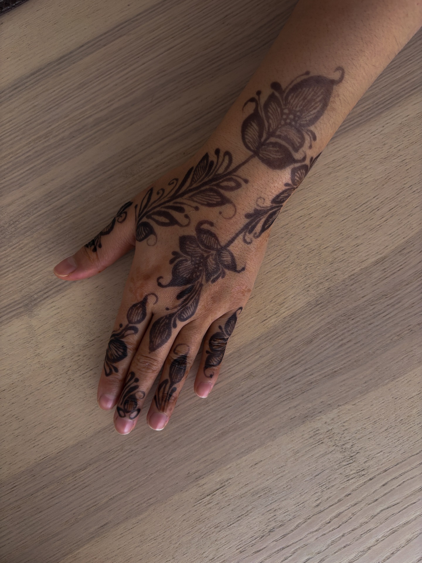 Floral henna hand design